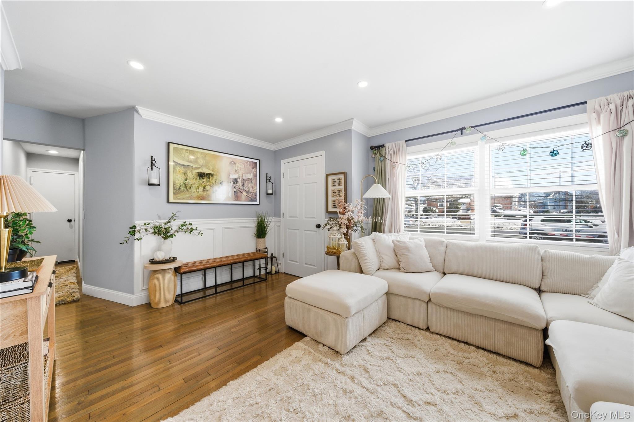 192 Mill Road Valley Stream, NY 11581 - Photo 23 of 26 a living room with furniture and a large window