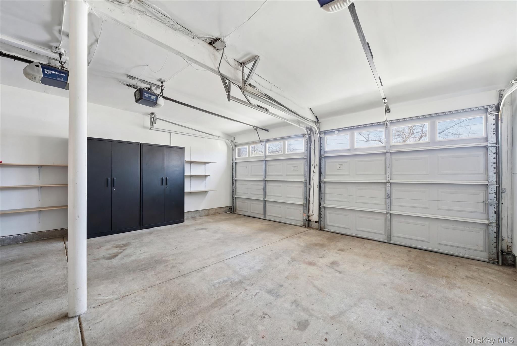 192 Mill Road Valley Stream, NY 11581 - Photo 25 of 26 a view of a room with cabinets