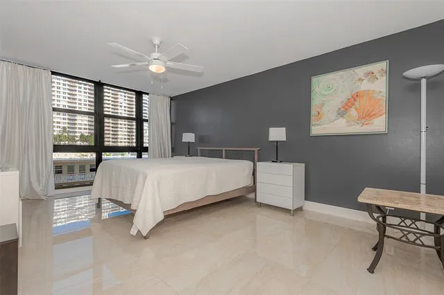 a kitchen with stainless steel appliances a stove and cabinets