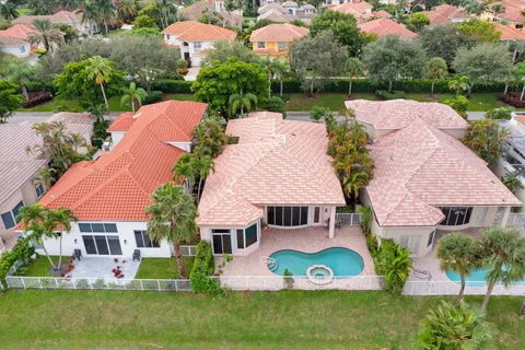 a aerial view of a house with a garden and plants
