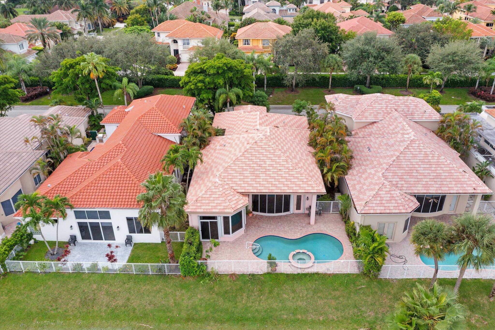 7081 Mallorca Crescent Boca Raton, FL 33433 - Photo 22 of 26 a aerial view of a house with a garden and plants