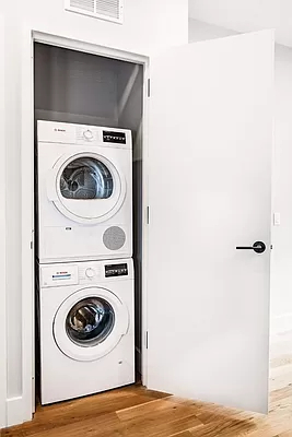 a view of washer and dryer in a utility room