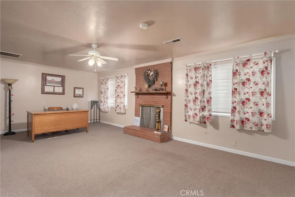 559 East Chico, CA 95928 - Photo 6 of 32 a spacious bedroom with a bed and a couch