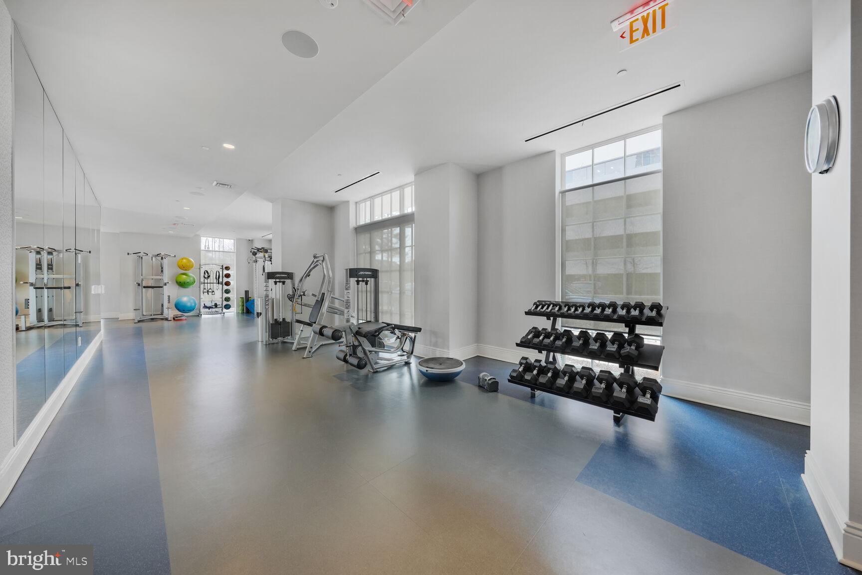 6900 Fleetwood Road, Unit 401 McLean, VA 22101 - Photo 24 of 29 a living room with furniture and wooden floor