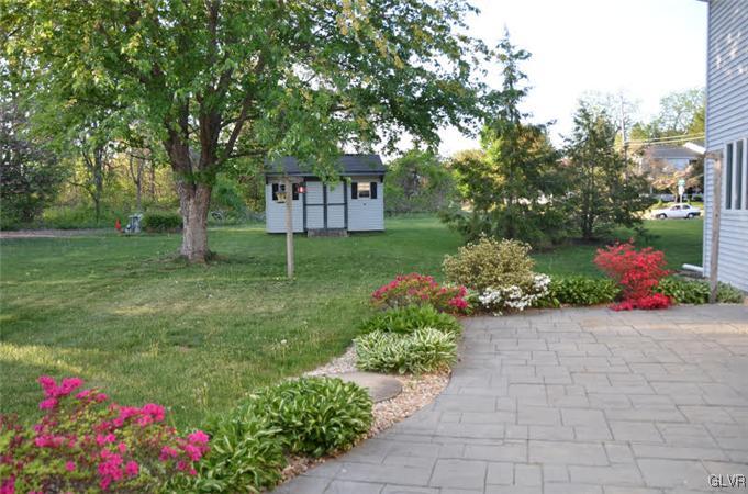 3305 Fischer Road Easton, PA 18045 - Photo 15 of 16 a view of a garden with flowers and trees