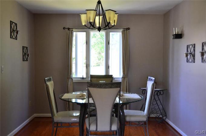 3305 Fischer Road Easton, PA 18045 - Photo 8 of 16 a view of a dining room with furniture window and wooden floor