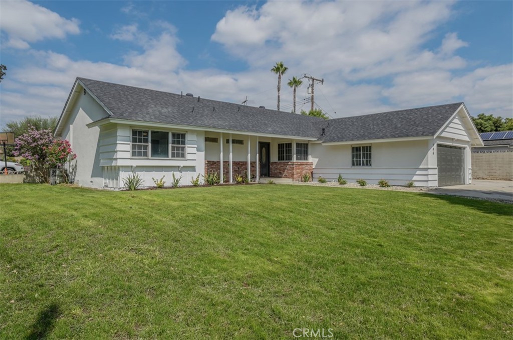 146 Irving Way Upland, CA 91786 - Photo 1 of 1 a front view of house with yard and green space