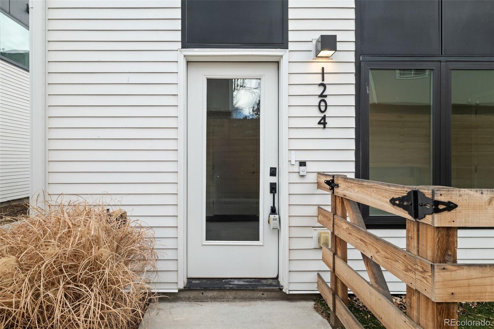 1204 South Reed Street Lakewood, CO 80232 - Photo 2 of 45 a view of entryway