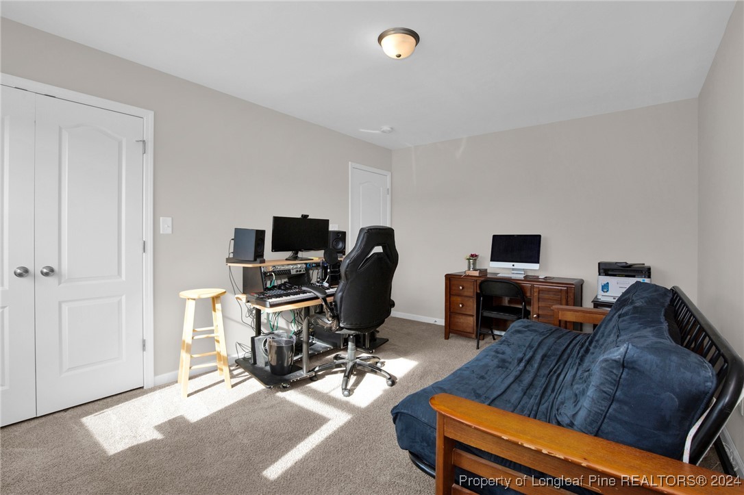 181 Chatfield Dr. Raeford, NC 28376 - Photo 27 of 36 a view of a workspace with furniture and a window