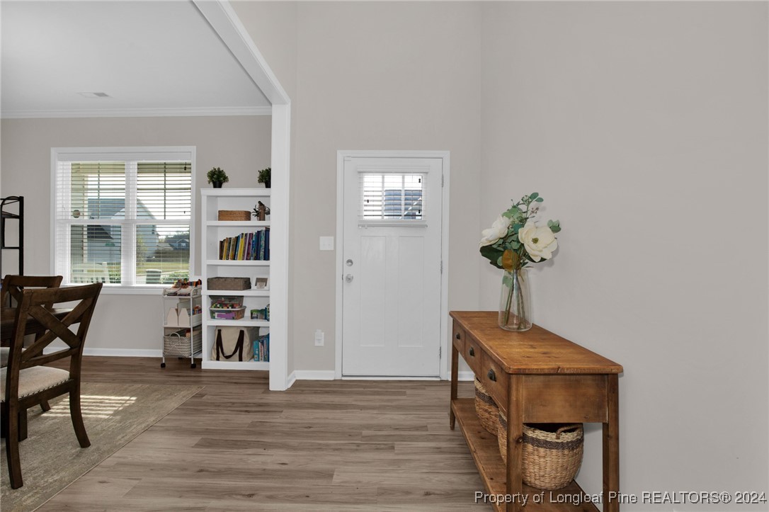 181 Chatfield Dr. Raeford, NC 28376 - Photo 3 of 36 a room with furniture and wooden floor