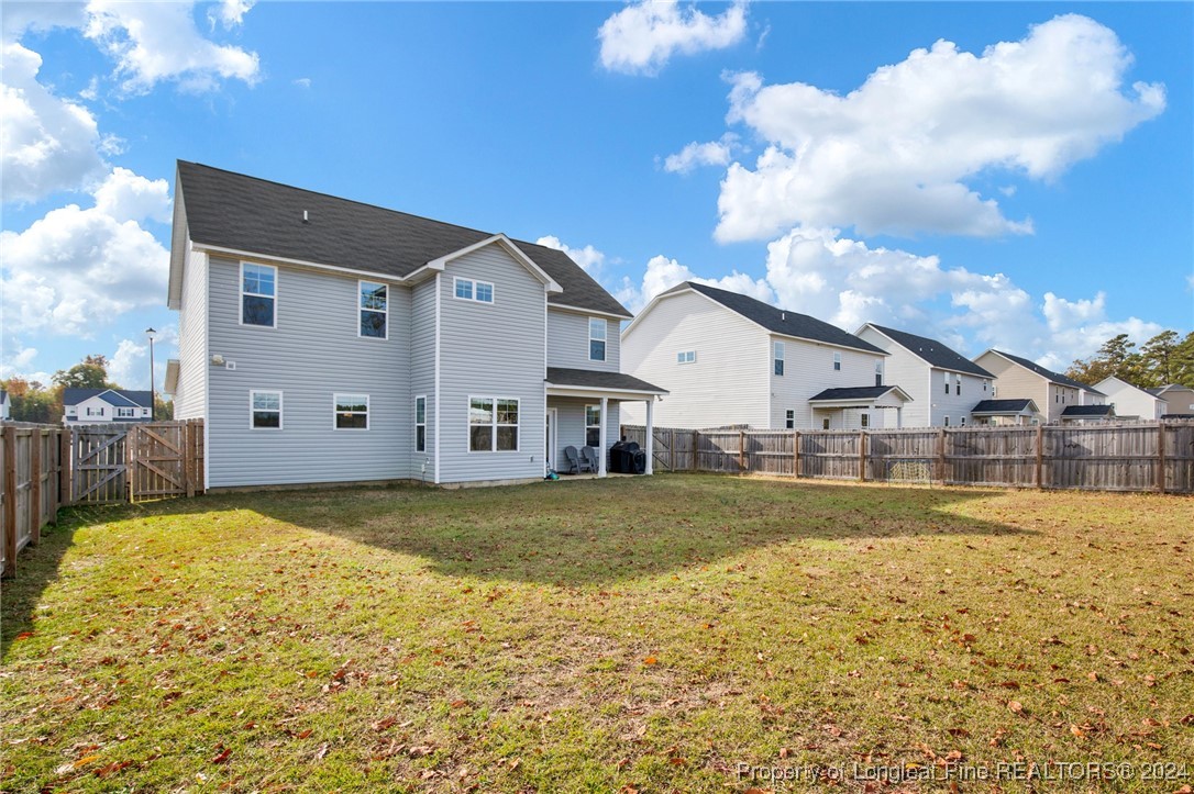 181 Chatfield Dr. Raeford, NC 28376 - Photo 33 of 36 a view of a house with a yard