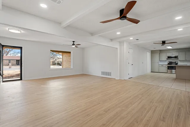 a view of an empty room and window