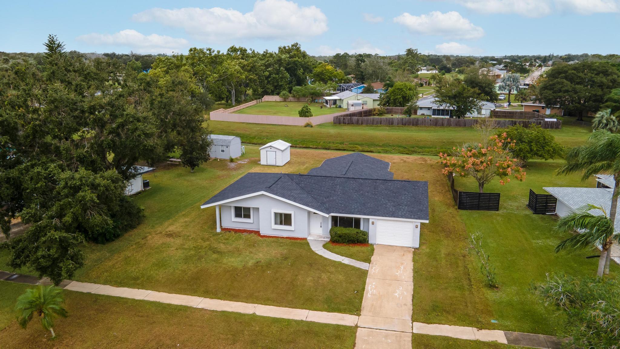 867 Riviera Drive Northeast Palm Bay, FL 32905 - Photo 2 of 48 DJI_0115