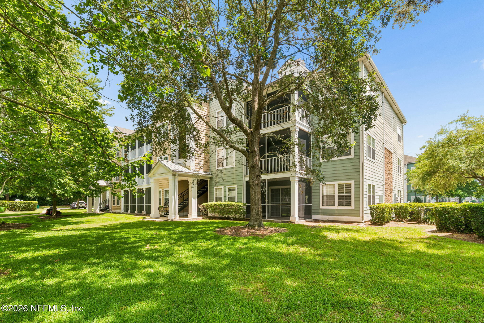 8550 Touchton Road, Unit 511 Jacksonville, FL 32216 - Photo 35 of 63 a front view of a building with a garden