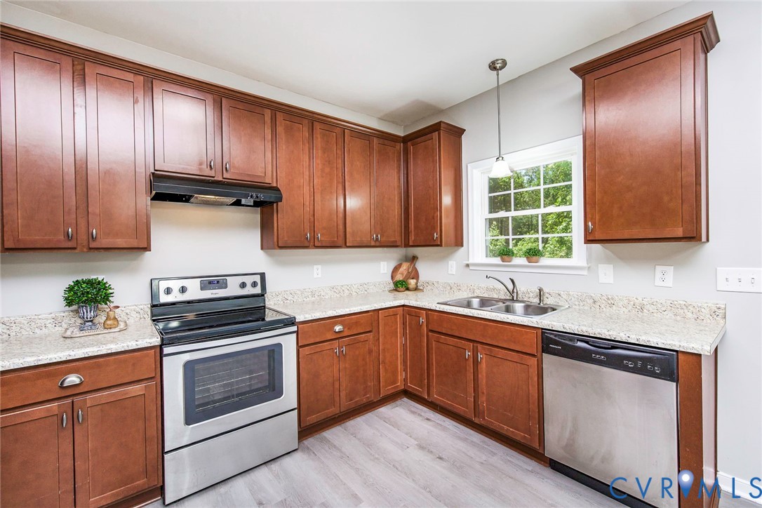 1297 Manfield Road Aylett, VA 23009 - Photo 18 of 41 a kitchen with sink cabinets and stainless steel appliances