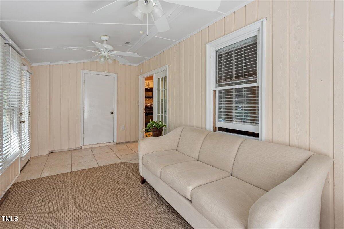 721 Tan Tara Square Raleigh, NC 27615 - Photo 14 of 26 a living room with furniture and windows