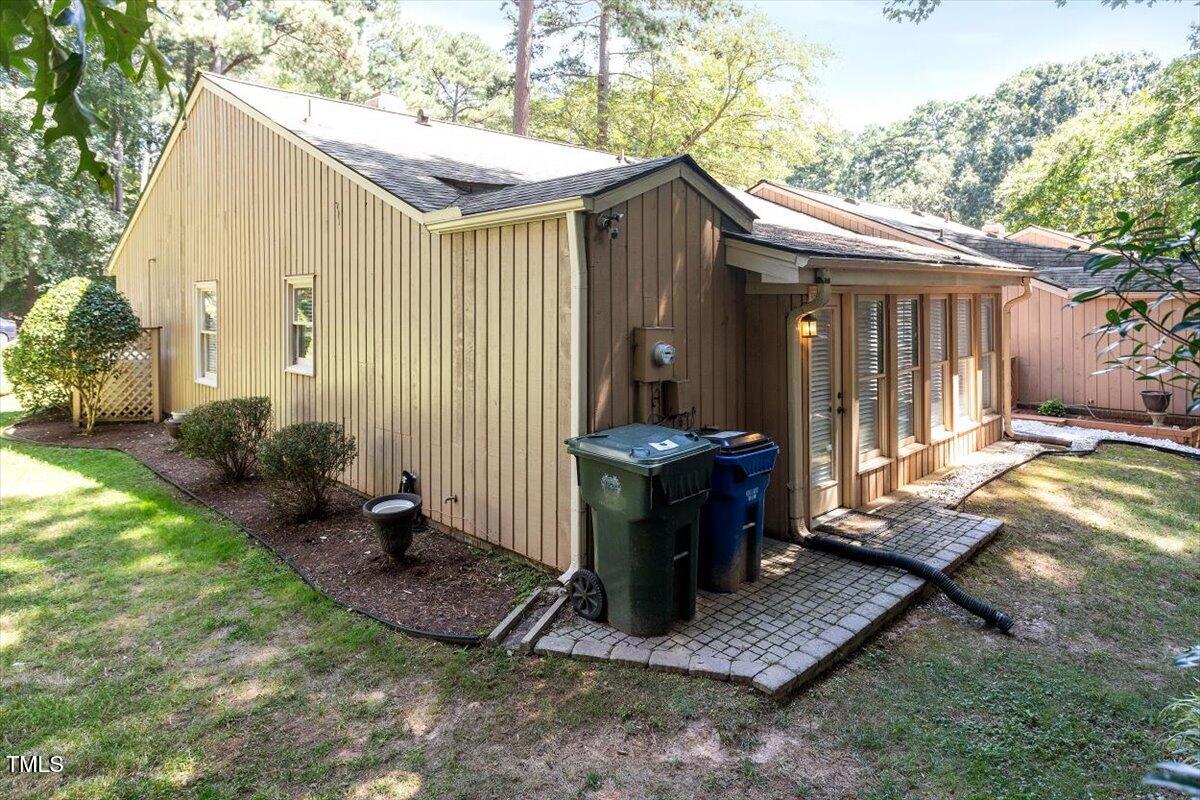 721 Tan Tara Square Raleigh, NC 27615 - Photo 25 of 26 a backyard of a house with yard barbeque oven and outdoor seating