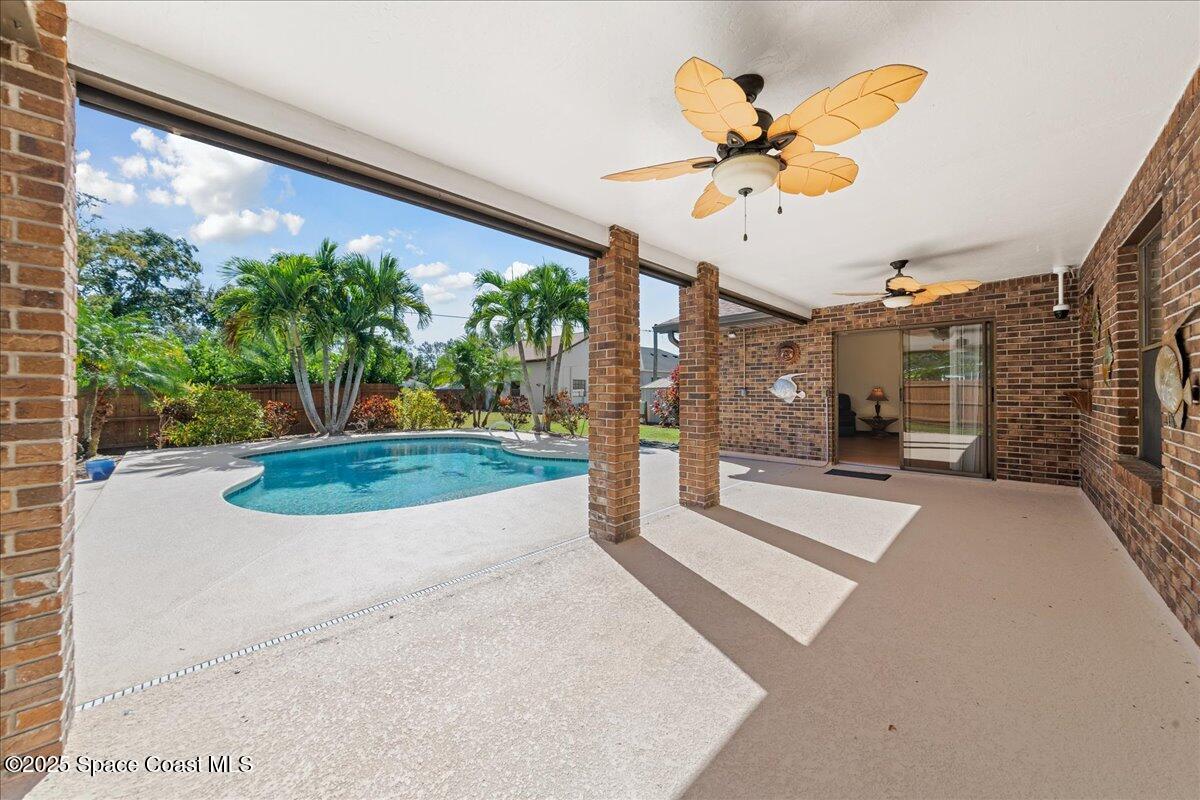 257 Avens Road Northeast Palm Bay, FL 32907 - Photo 27 of 52 a view of a living room with a porch