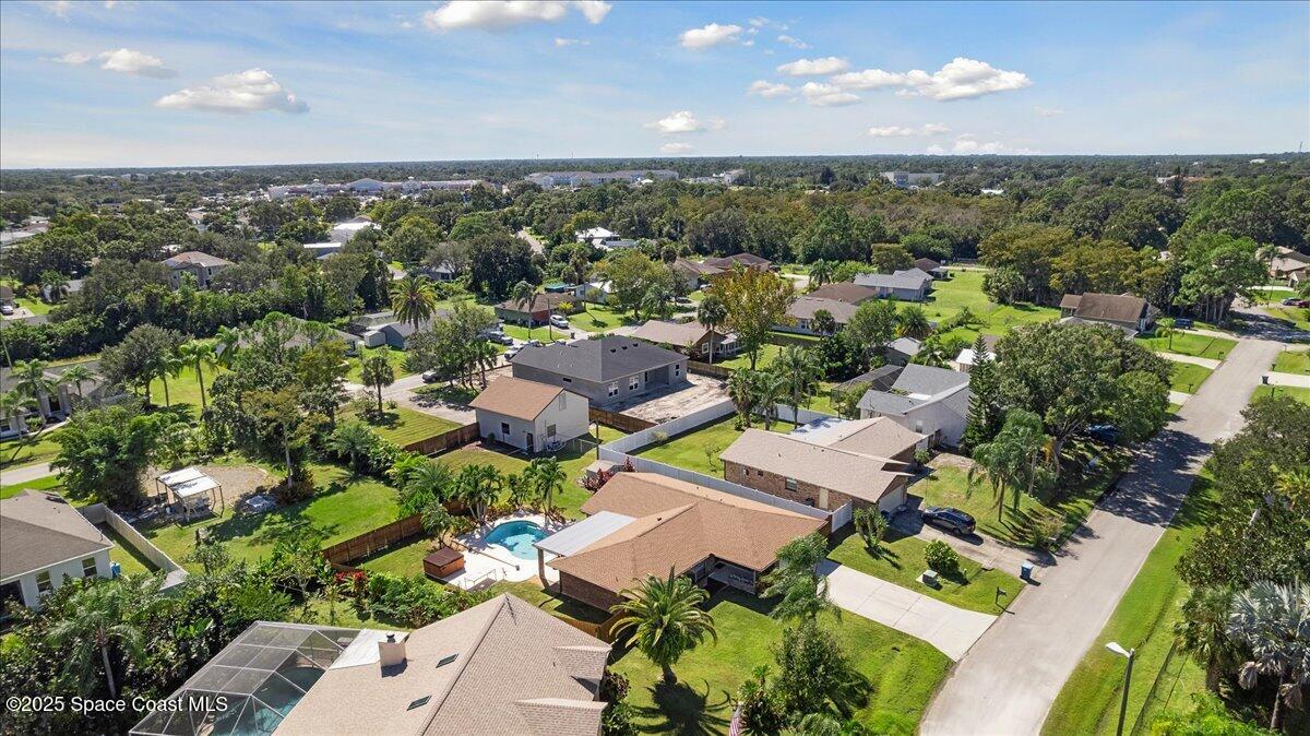 257 Avens Road Northeast Palm Bay, FL 32907 - Photo 38 of 52 an aerial view of multiple house
