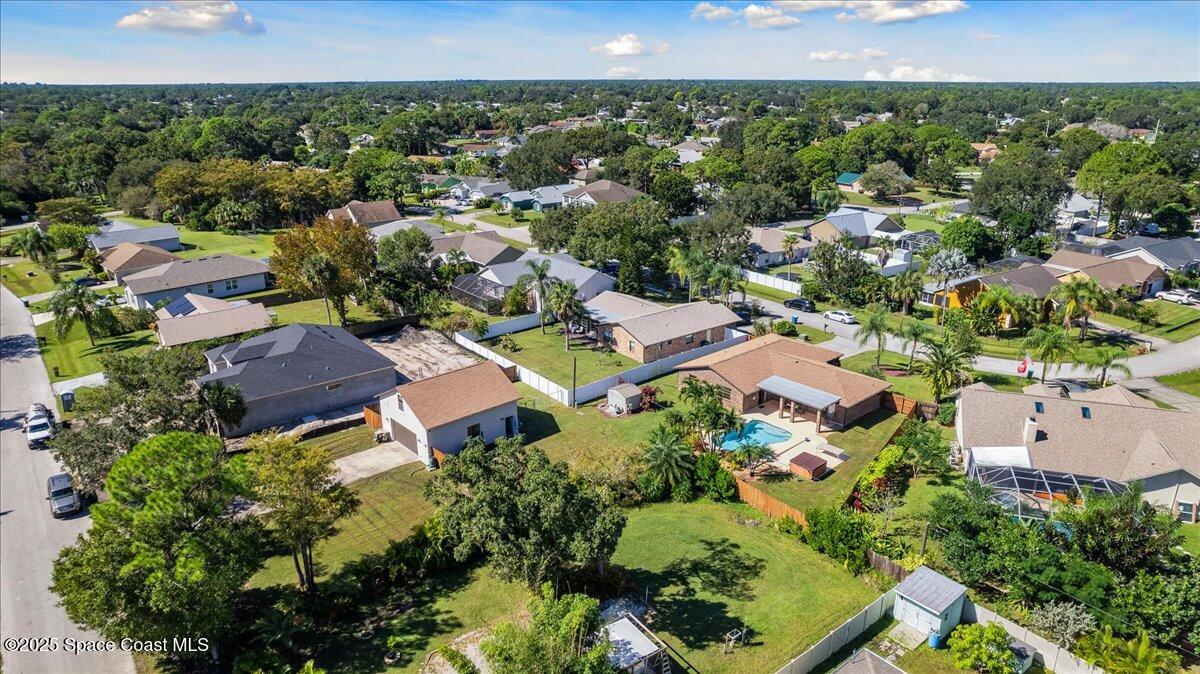 257 Avens Road Northeast Palm Bay, FL 32907 - Photo 39 of 52 an aerial view of multiple house