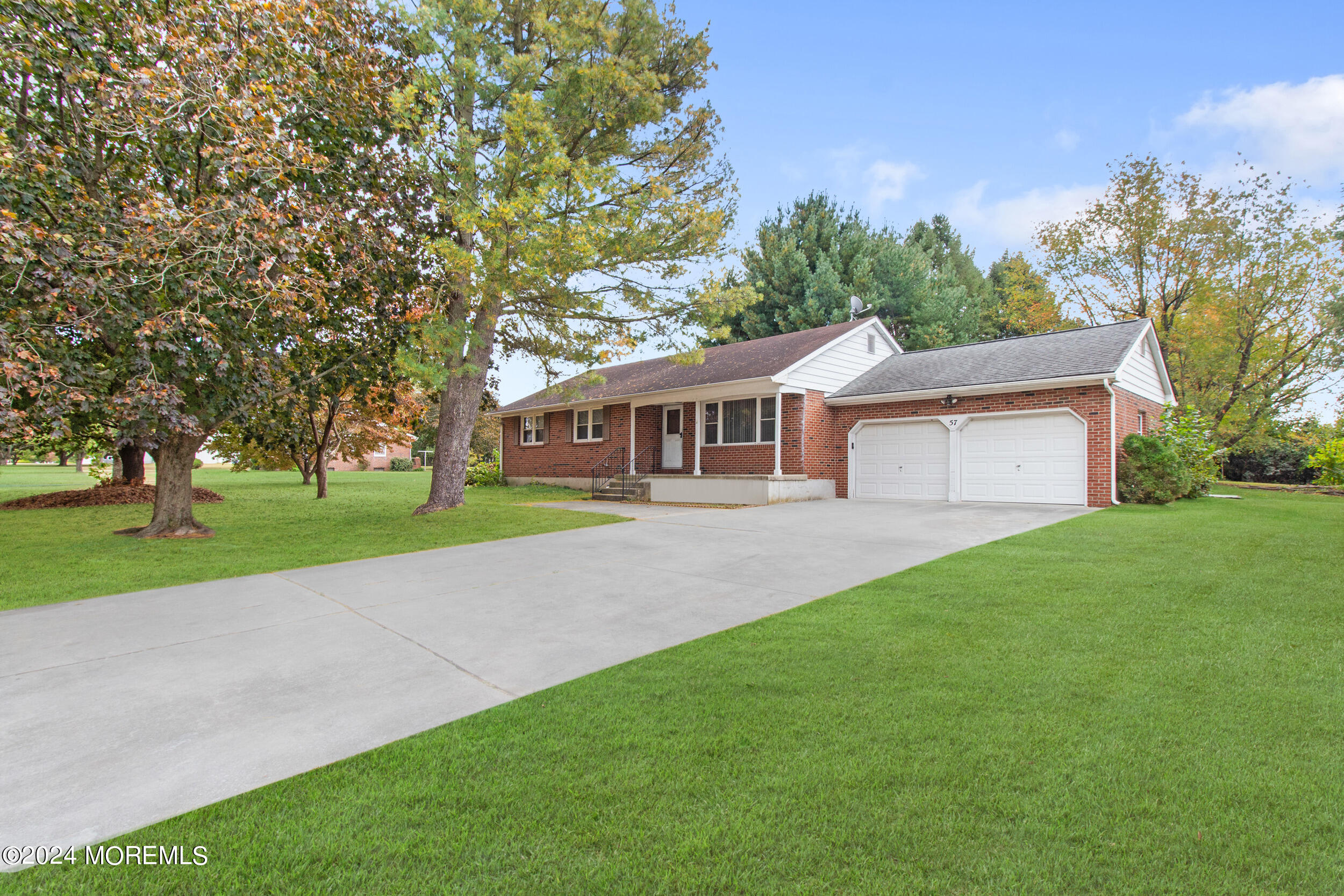 57 Quaker Road Mickleton, NJ 08056 - Photo 1 of 41 a view of house with a big yard and large trees