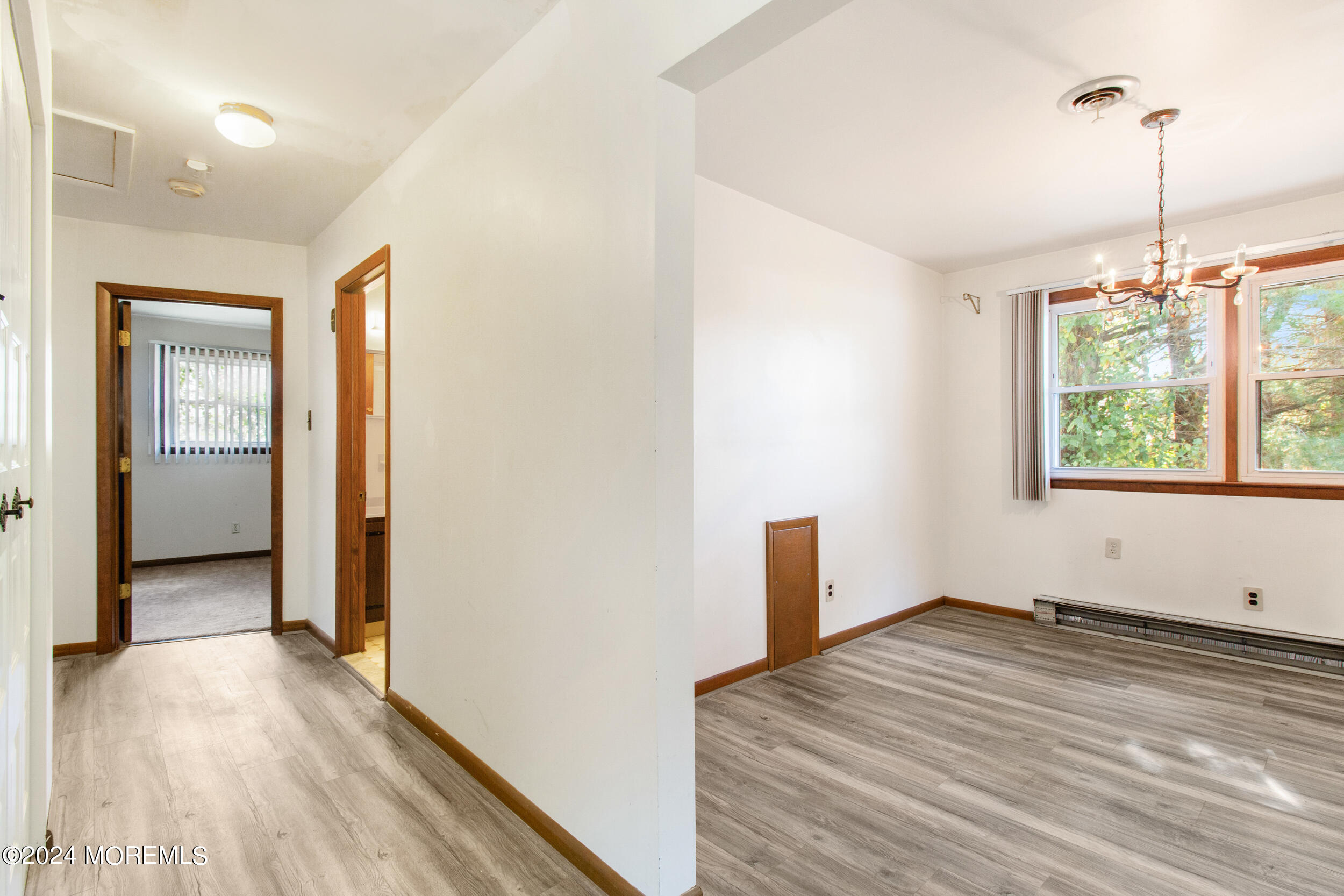 57 Quaker Road Mickleton, NJ 08056 - Photo 7 of 41 a view of empty room with wooden floor and fan