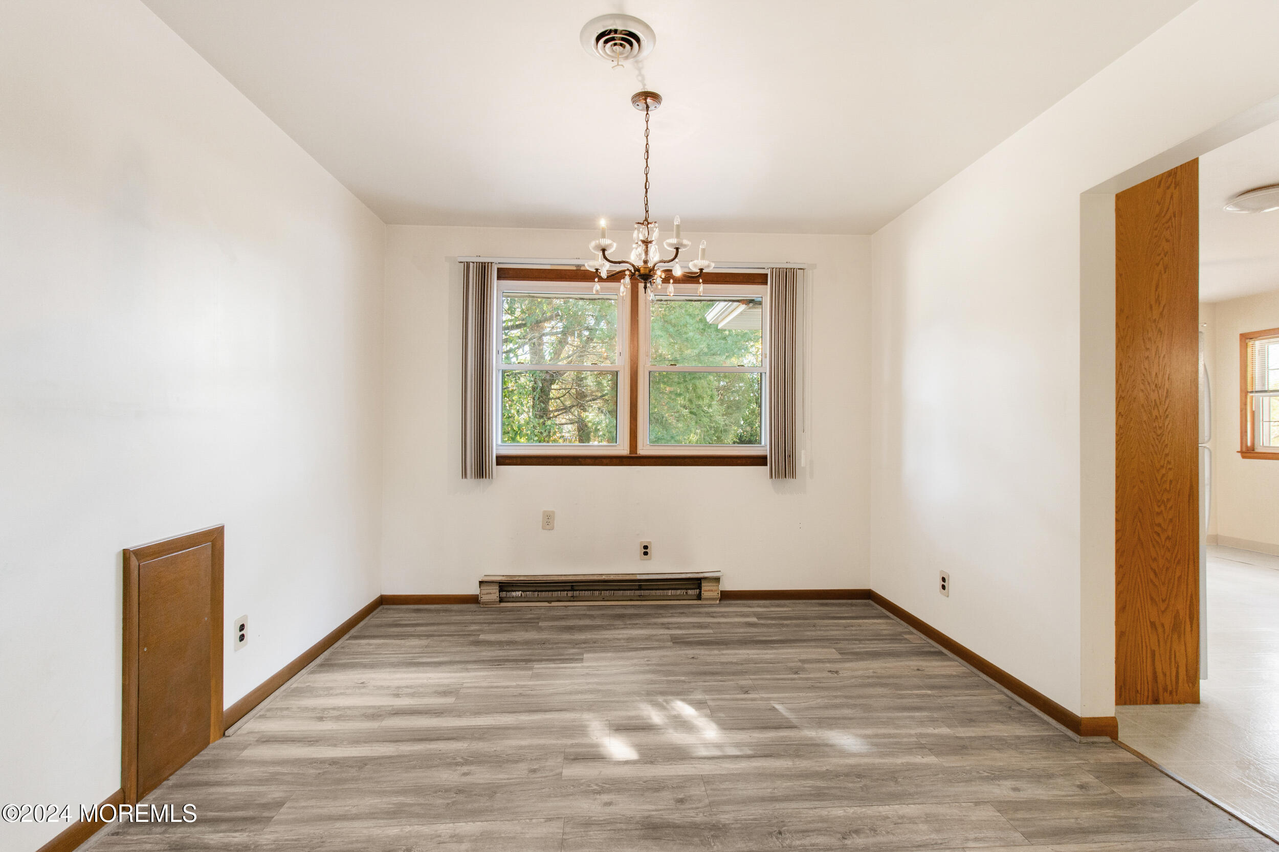 57 Quaker Road Mickleton, NJ 08056 - Photo 8 of 41 a view of a room with wooden floor outdoor space and windows