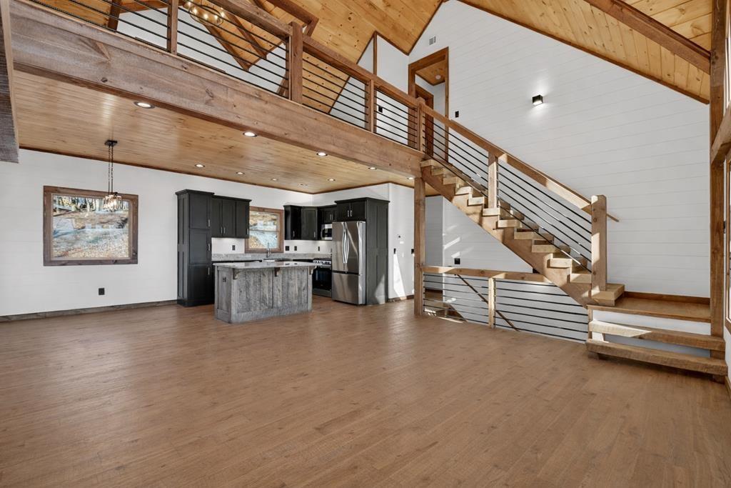 142 Red Oak Trail Ellijay, GA 30540 - Photo 11 of 63 a view of an empty room with stairs
