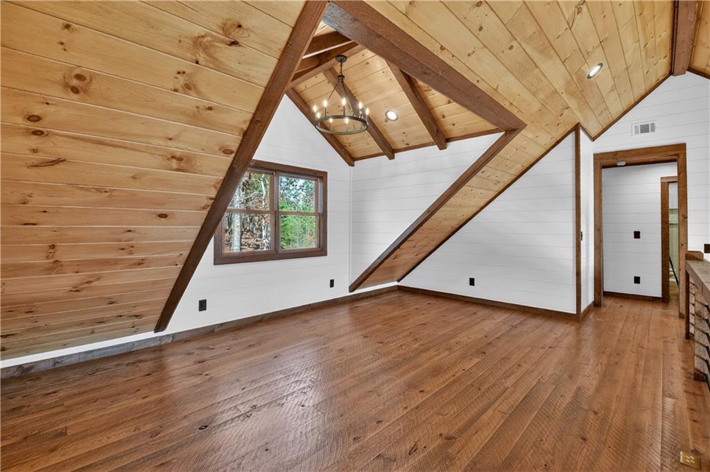 142 Red Oak Trail Ellijay, GA 30540 - Photo 27 of 63 a view of a room with wooden floor and white walls
