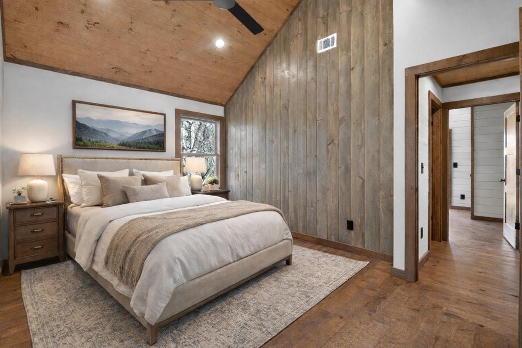 142 Red Oak Trail Ellijay, GA 30540 - Photo 28 of 63 a bedroom with a bed and painting on the wall