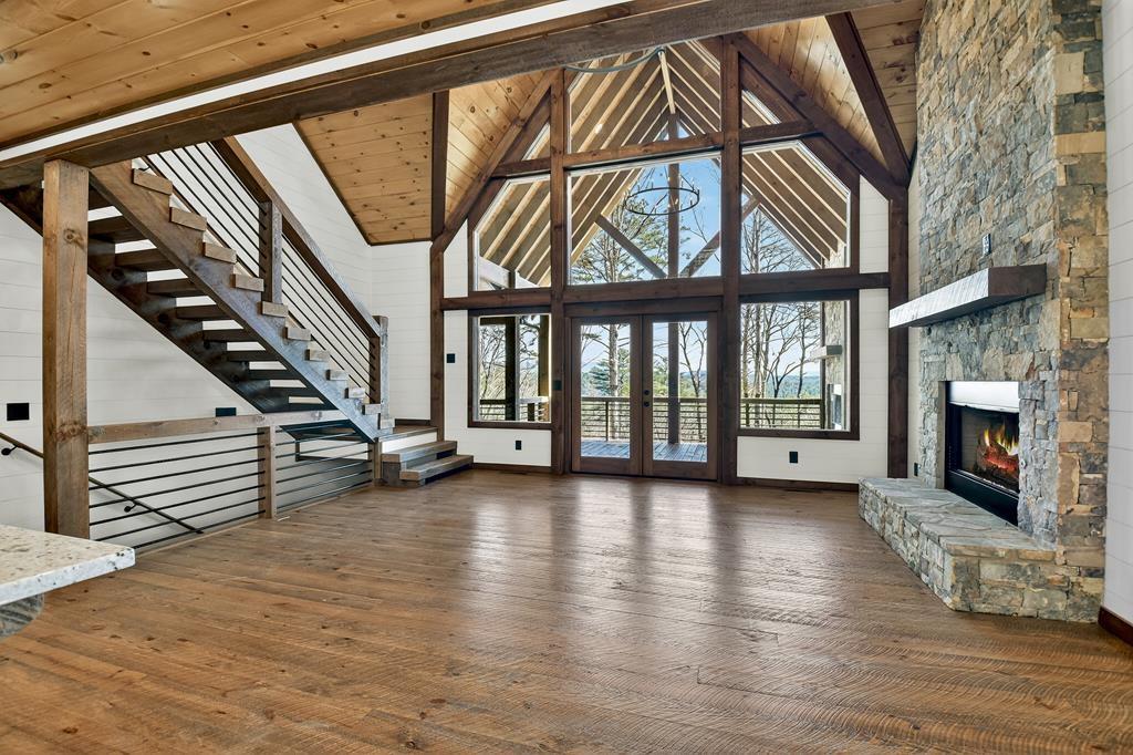 142 Red Oak Trail Ellijay, GA 30540 - Photo 9 of 63 a view of an entryway with wooden floor door and a front door