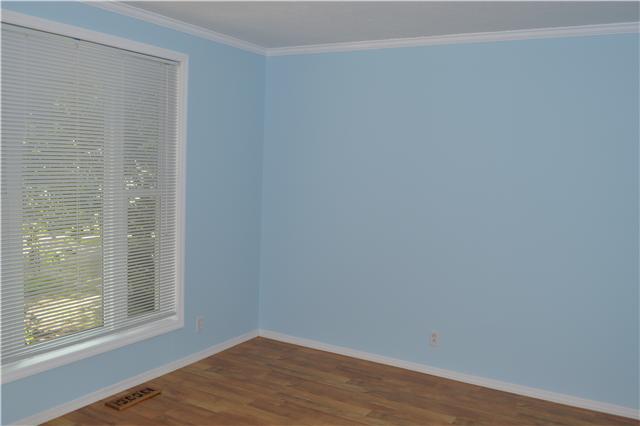 208 Turtle Neck Road Fairview, TN 37062 - Photo 14 of 20 a view of a small space with wooden floor and a window