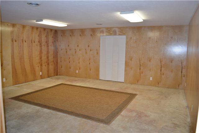 208 Turtle Neck Road Fairview, TN 37062 - Photo 17 of 20 a view of a room with a wooden fence