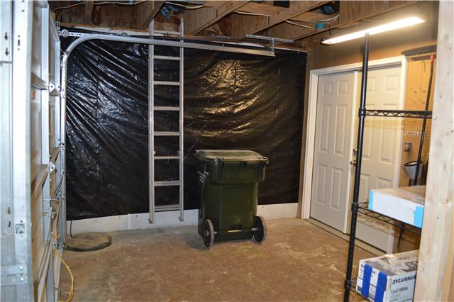 208 Turtle Neck Road Fairview, TN 37062 - Photo 18 of 20 a view of walk in closet with clothes and shoes