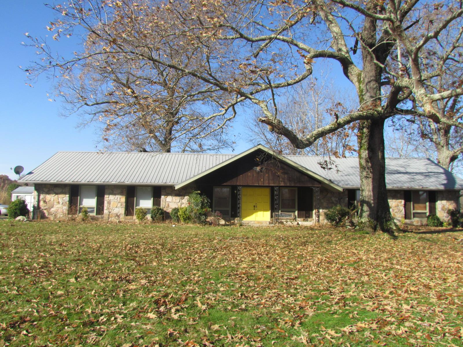 510 Bush Road Manchester, TN 37355 - Photo 1 of 21 a front view of a house with a yard