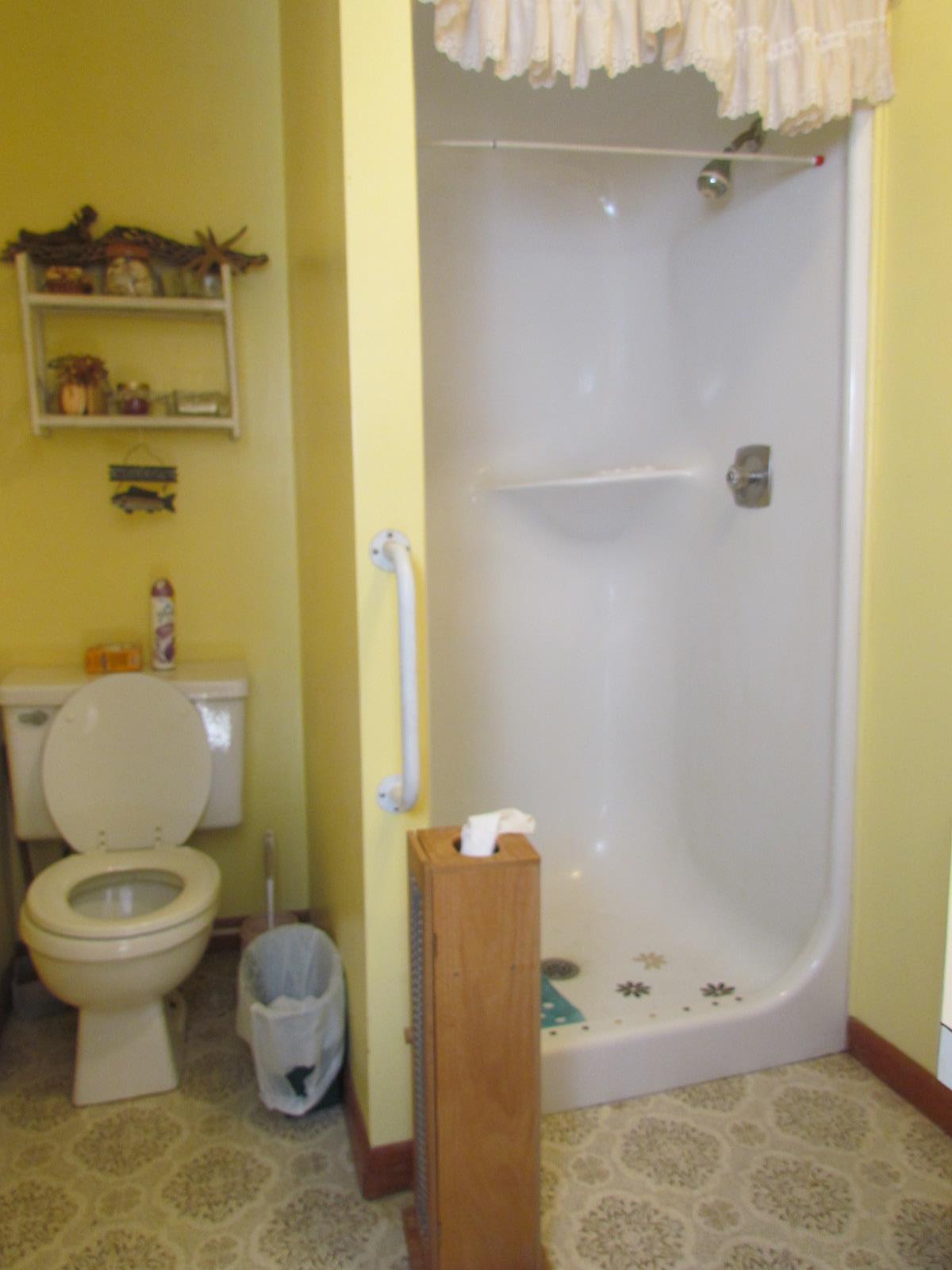 510 Bush Road Manchester, TN 37355 - Photo 14 of 21 a bathroom with a toilet and a shower