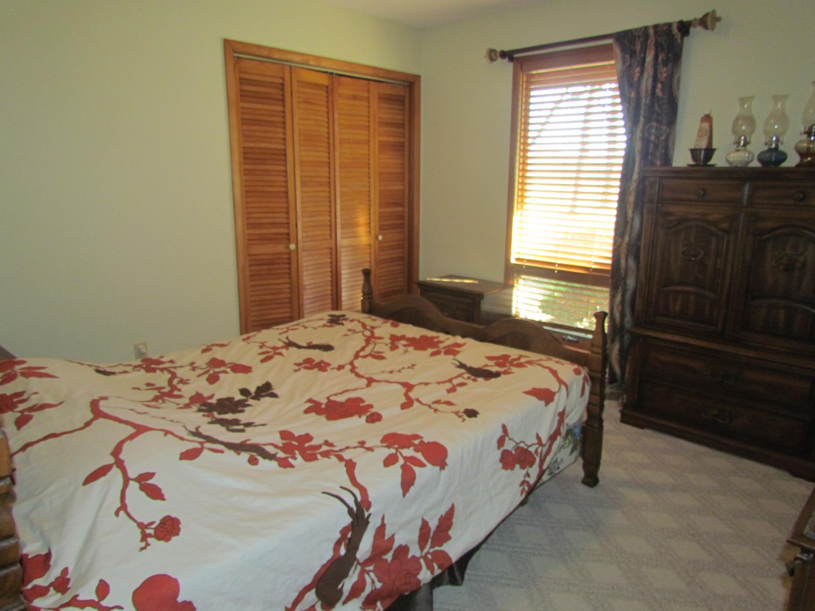 510 Bush Road Manchester, TN 37355 - Photo 9 of 21 a bedroom with a bed and a window