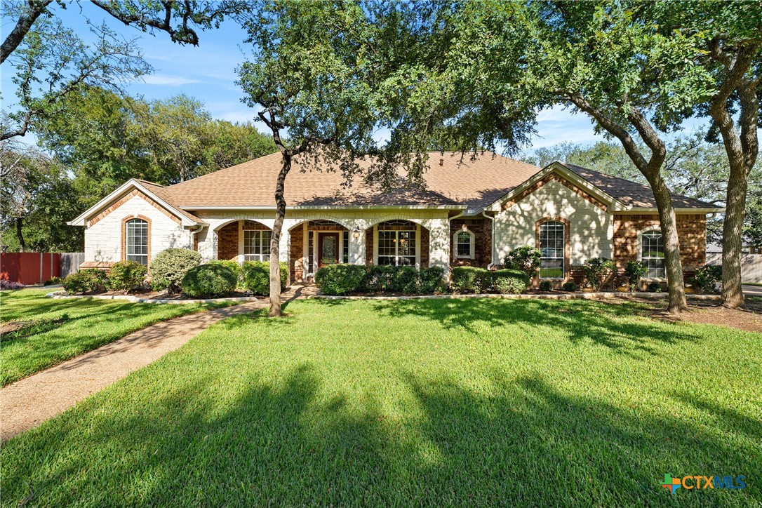 3300 Spring Canyon Road Belton, TX 76513 - Photo 1 of 1 a front view of a house with yard and green space