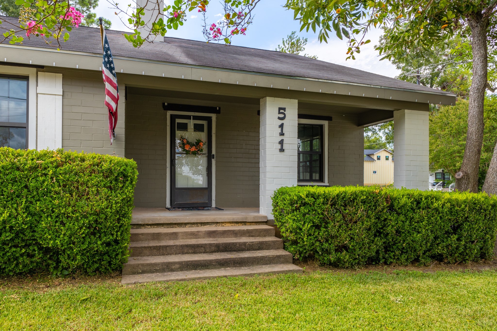 511 West Val Verde Street Brenham, TX 77833 - Photo 23 of 23 a front view of a house with a garden