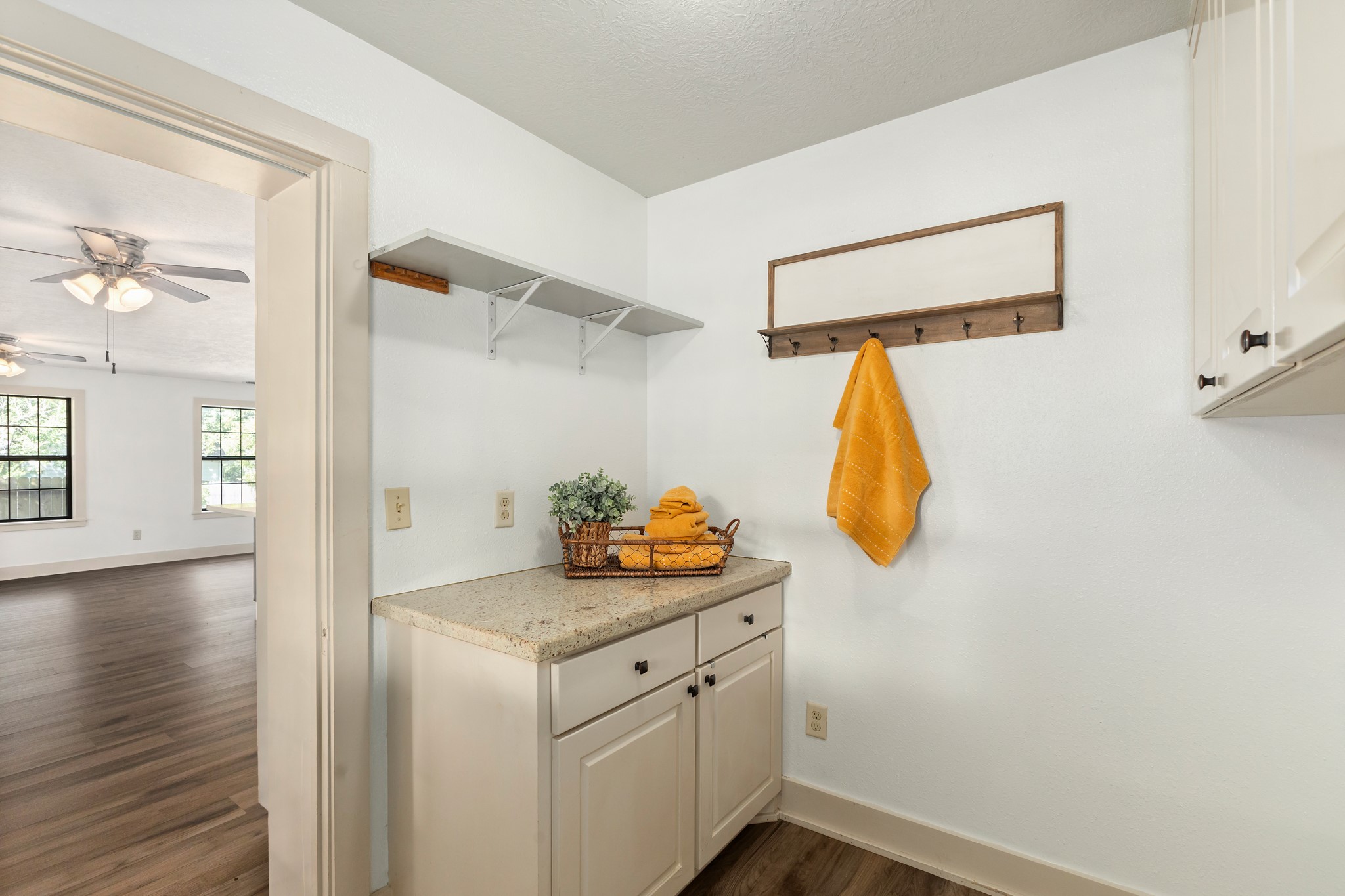 511 West Val Verde Street Brenham, TX 77833 - Photo 9 of 23 a bathroom with a granite countertop sink and a mirror