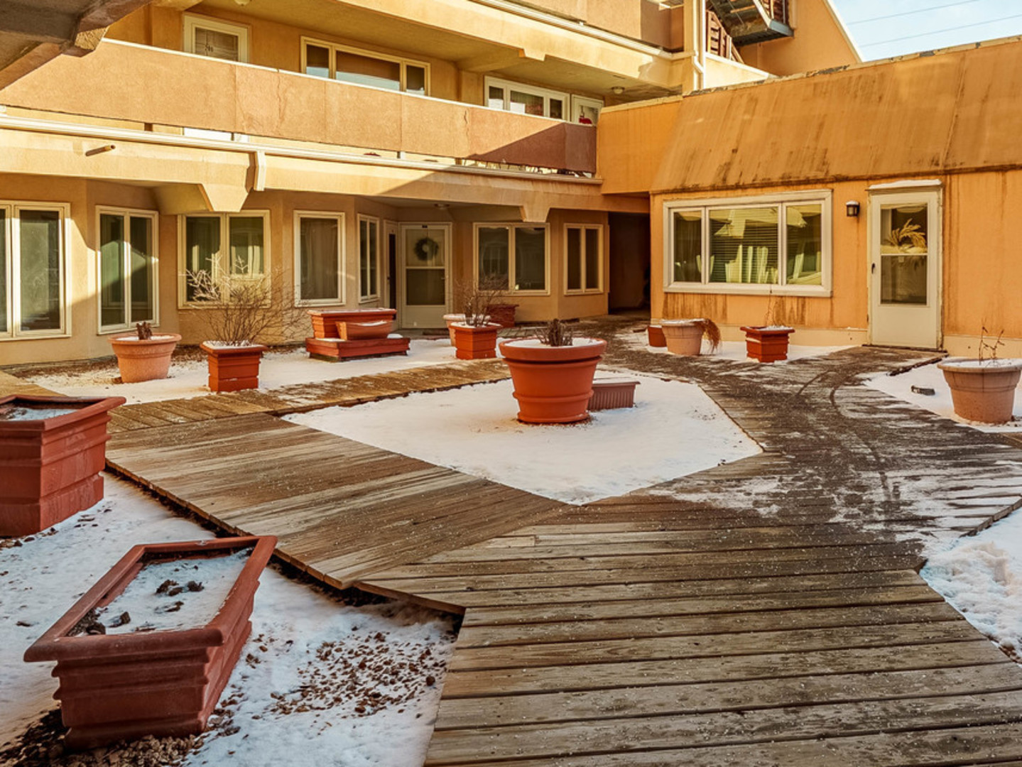 6337 Roosevelt Road, Unit 309 Berwyn, IL 60402 - Photo 1 of 27 an outdoor space with pool and furniture
