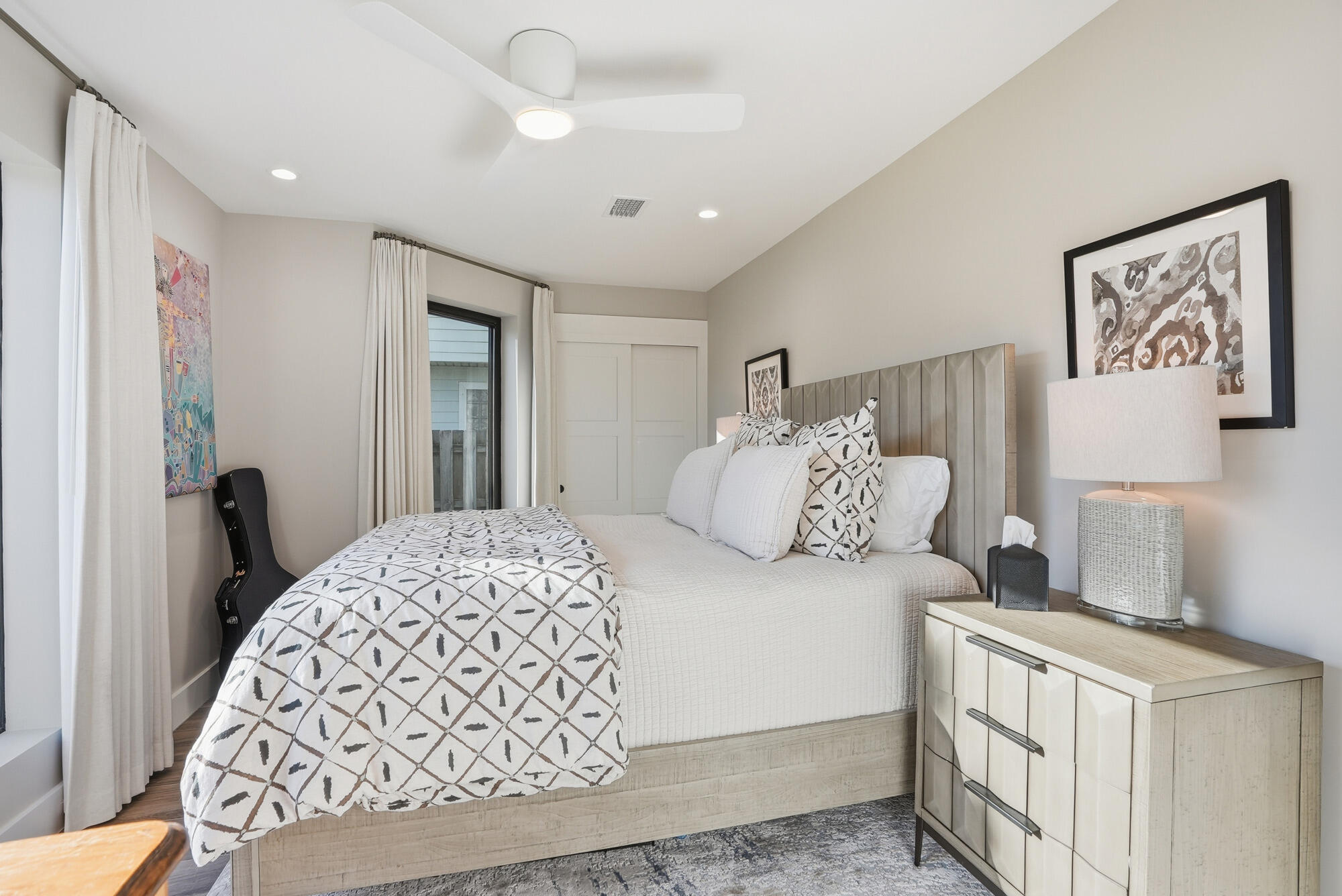 327 Sand Cliffs Drive Inlet Beach, FL 32461 - Photo 14 of 70 a bedroom with a large bed and a dresser