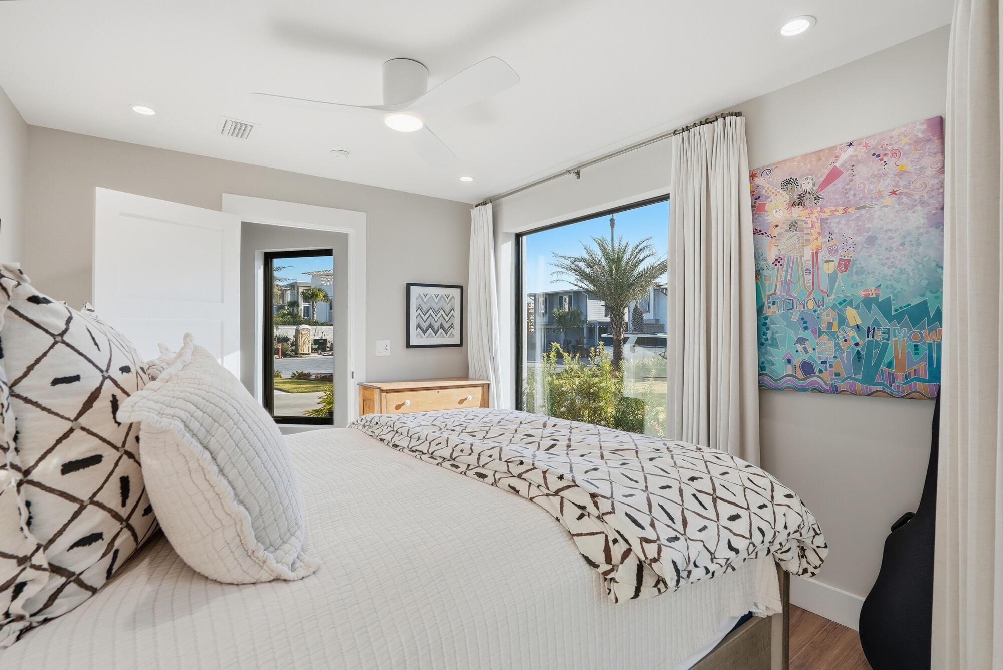 327 Sand Cliffs Drive Inlet Beach, FL 32461 - Photo 16 of 70 a bedroom with a large bed and a window