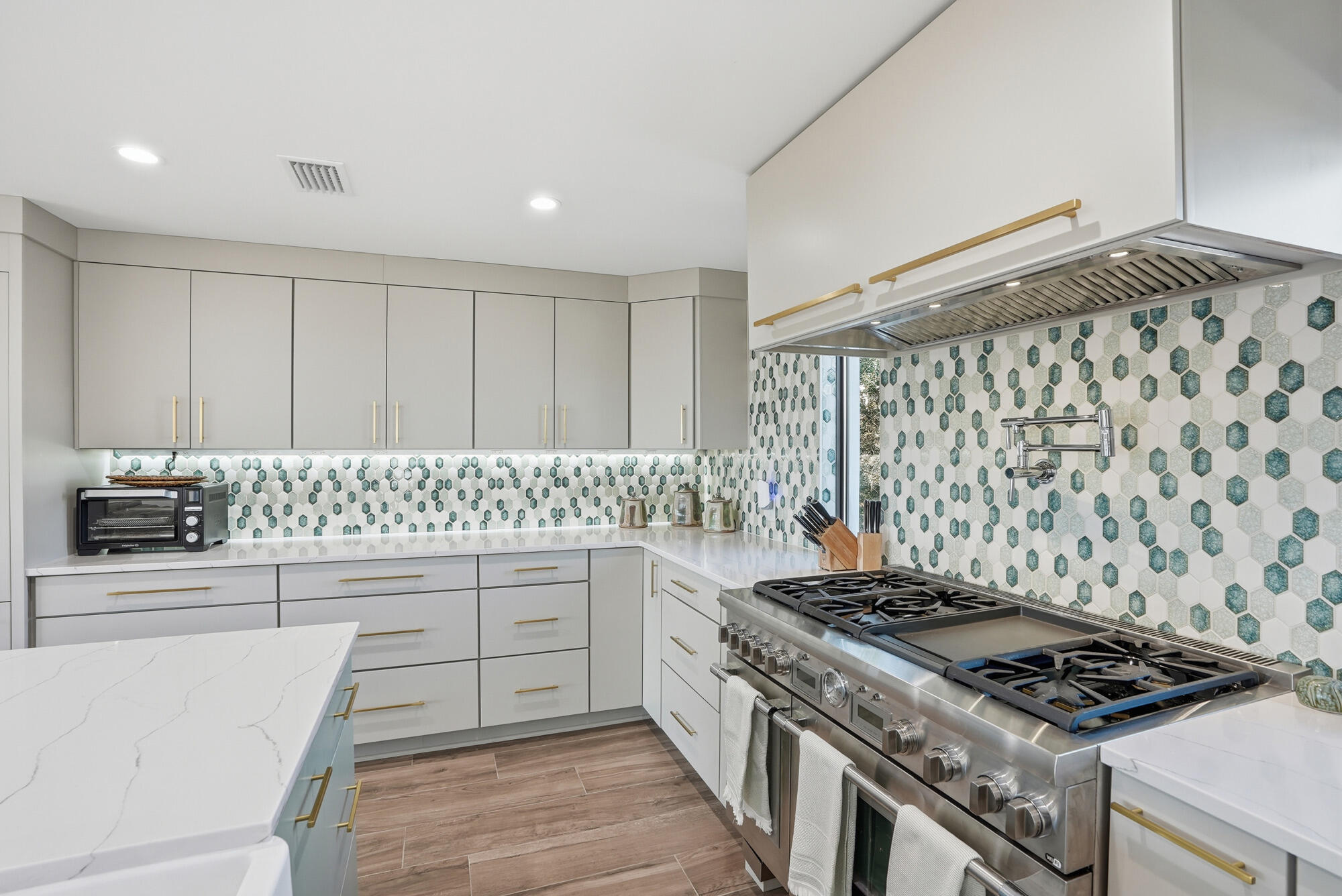 327 Sand Cliffs Drive Inlet Beach, FL 32461 - Photo 29 of 70 a kitchen with granite countertop a stove and a sink