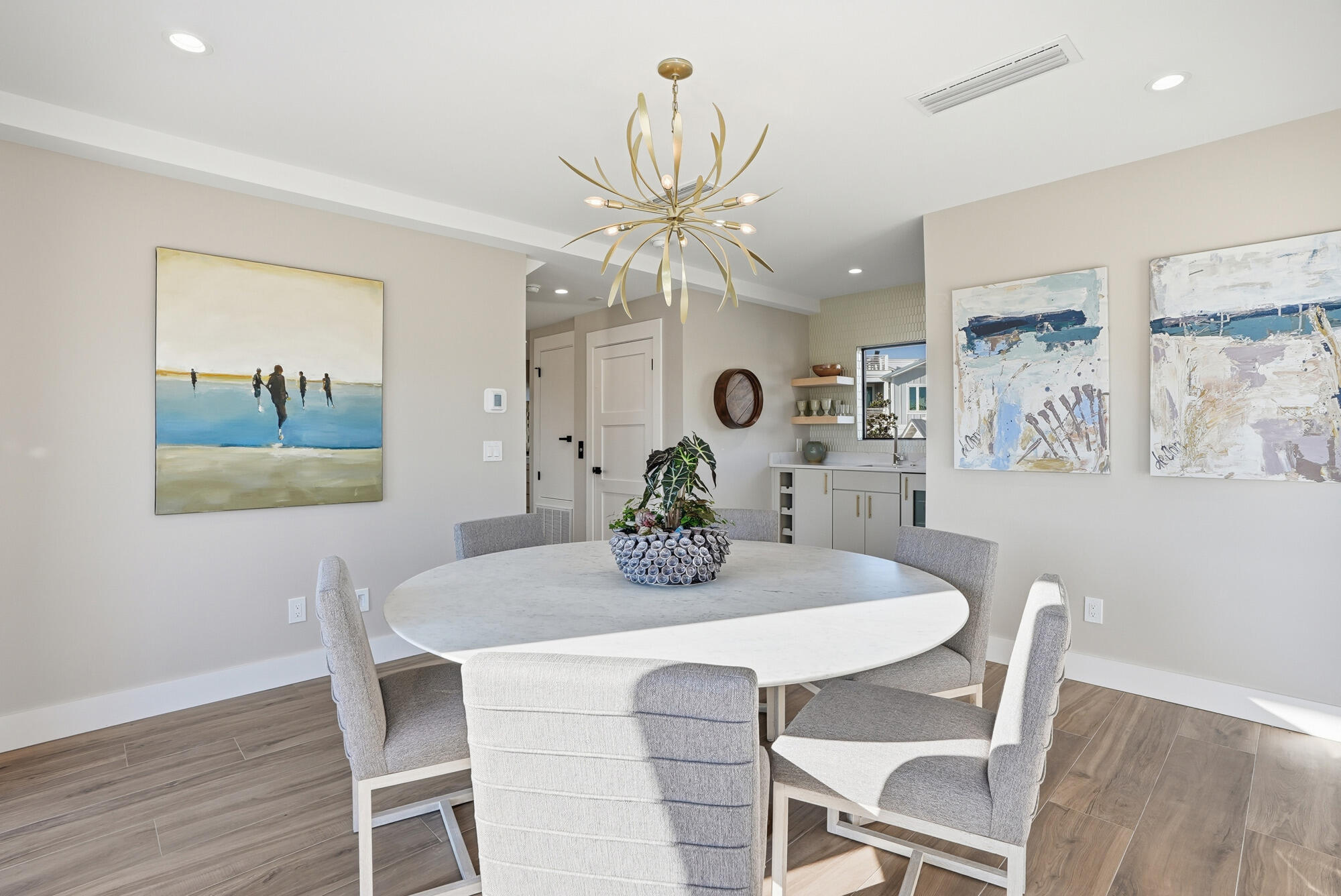 327 Sand Cliffs Drive Inlet Beach, FL 32461 - Photo 37 of 70 a view of a dining room with furniture and wooden floor