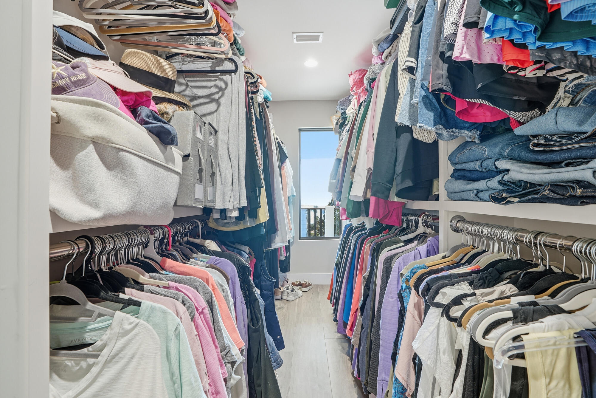 327 Sand Cliffs Drive Inlet Beach, FL 32461 - Photo 46 of 70 a view of walk in closet with clothes