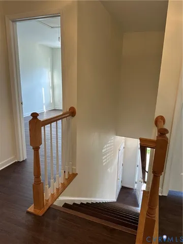a view of entryway with wooden floor