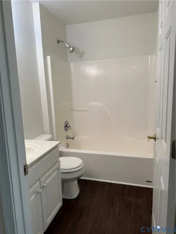 a bathroom with a sink a toilet and a bathtub