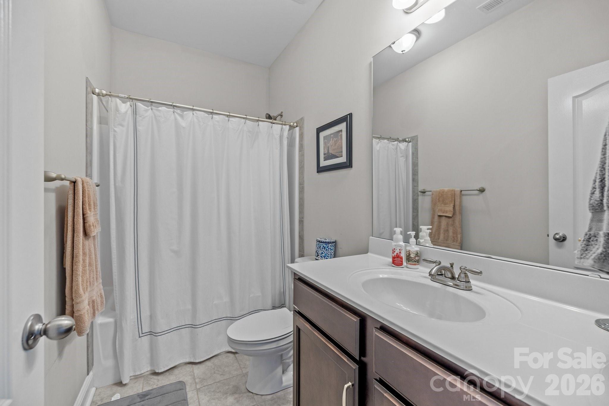 4697 Rinaldo Road York, SC 29745 - Photo 19 of 37 a bathroom with a sink toilet and shower