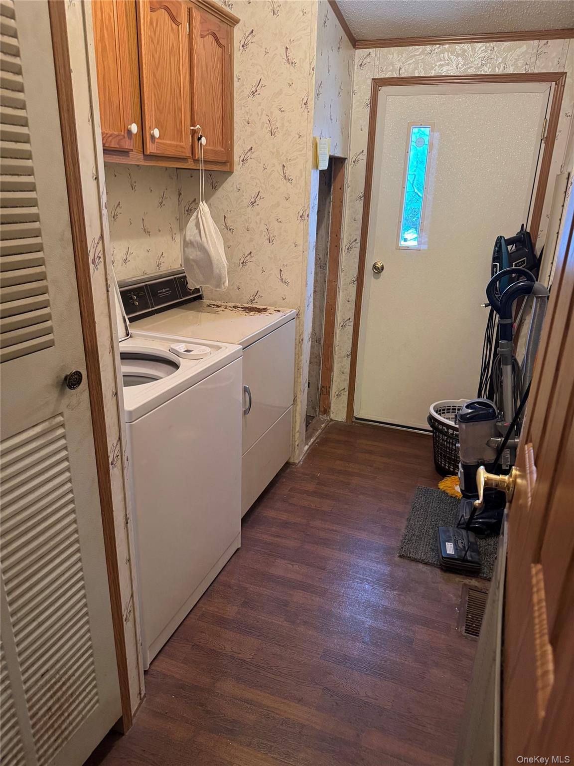 165 Benton Hollow Road Livingston Manor, NY 12758 - Photo 6 of 18 a kitchen with a sink a refrigerator and cabinets